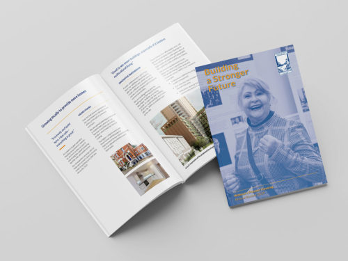 A double page spread and front cover of the WPH housing annual report